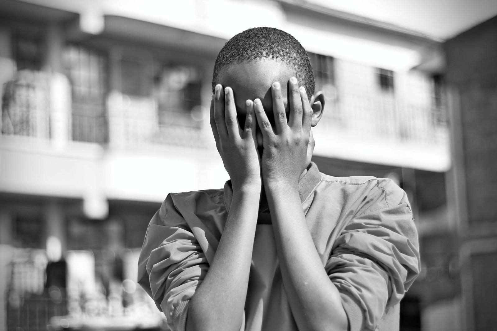 A Person Covering It S Face